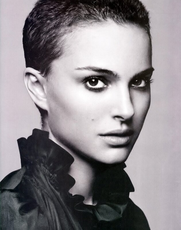 woman with short hair in black and white