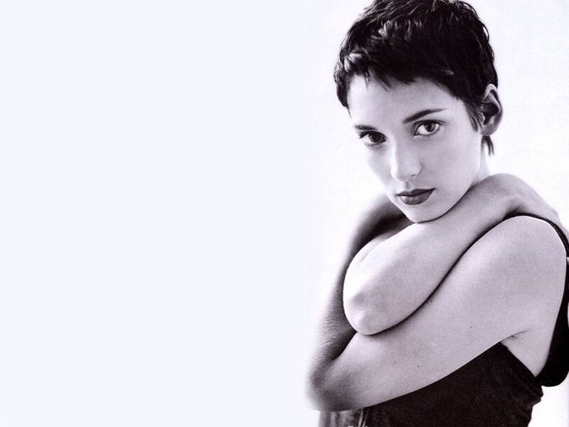 woman with short hair in black and white