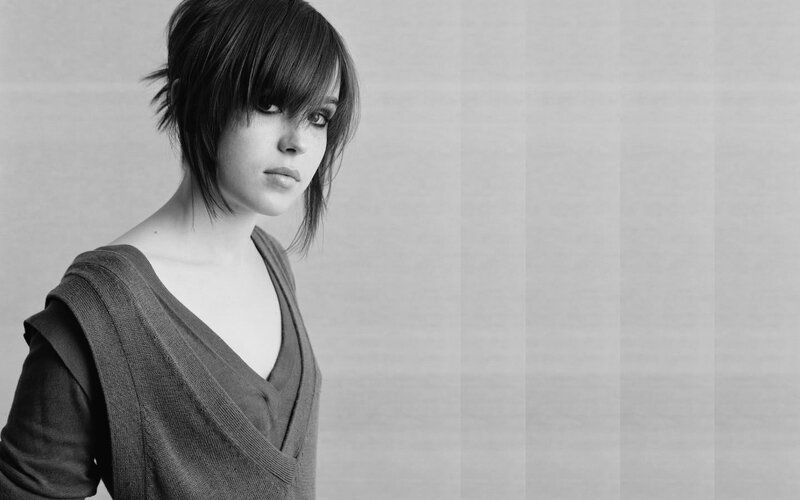 woman with short hair in black and white