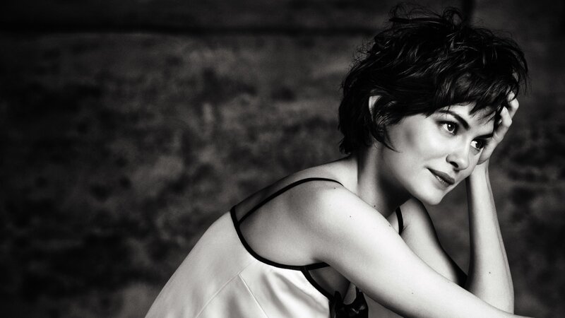 woman with short hair in black and white