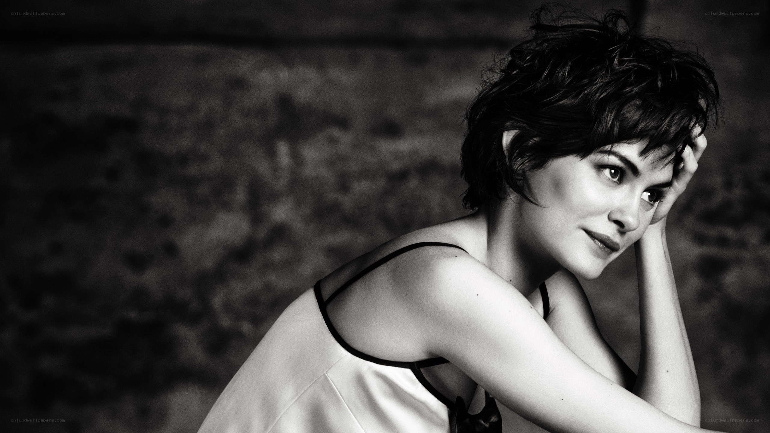 woman with short hair in black and white