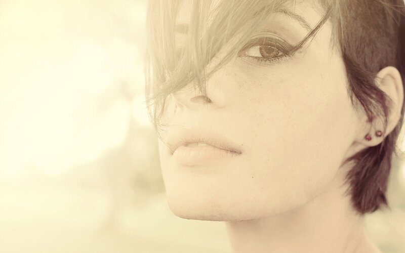 woman with short hair in sunlight