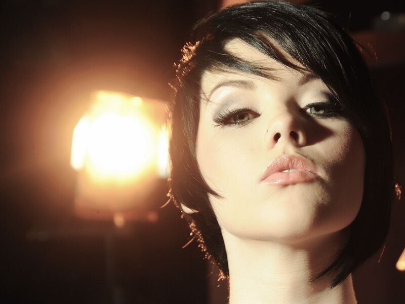 woman with short hair in warm light