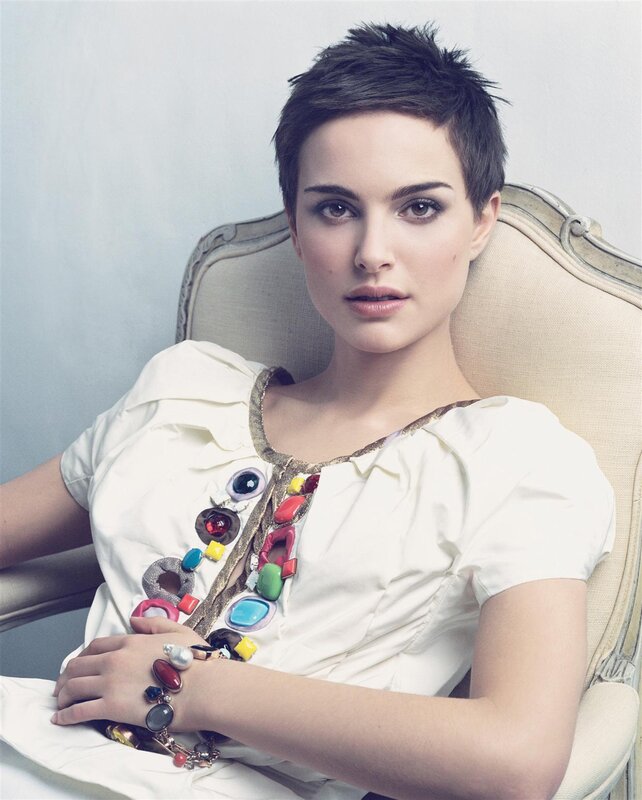 woman with short hair in white dress