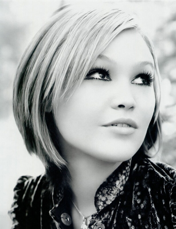 woman with short hair looking up