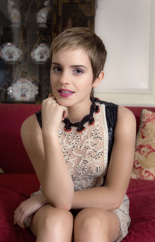 woman with short hair sitting