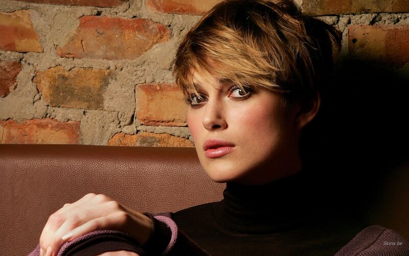 woman with short hair sitting