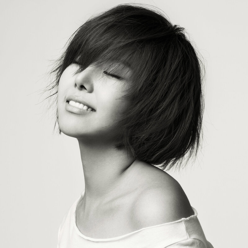 woman with short hair smiling