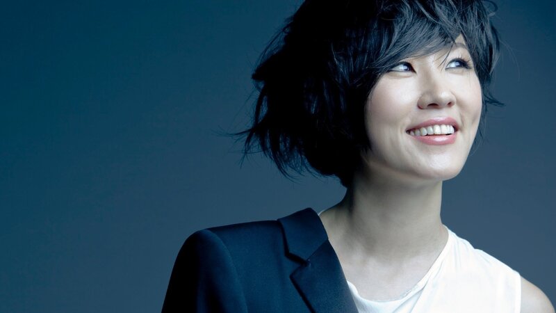 woman with short hair smiling