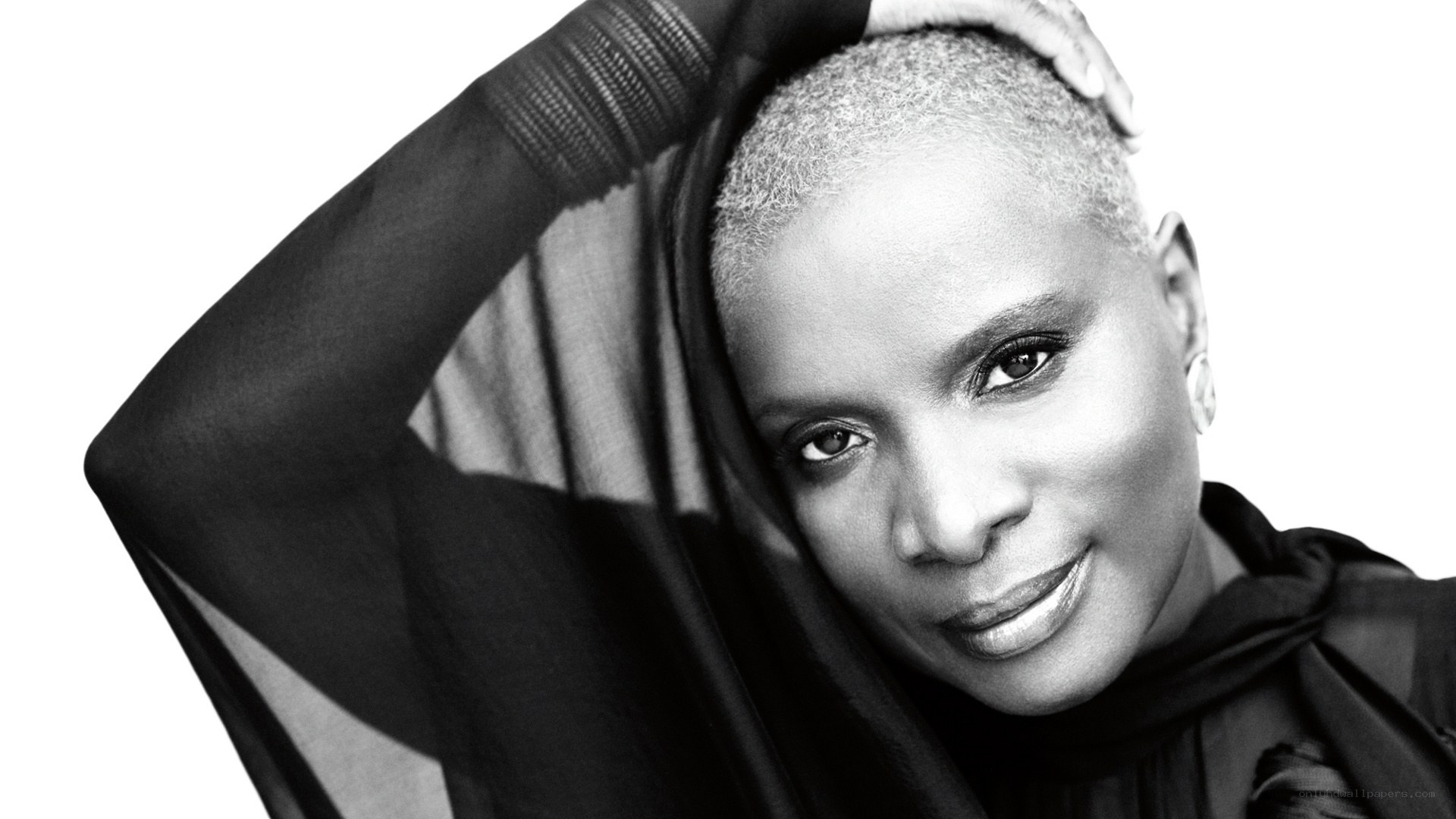 woman with short hair smiling