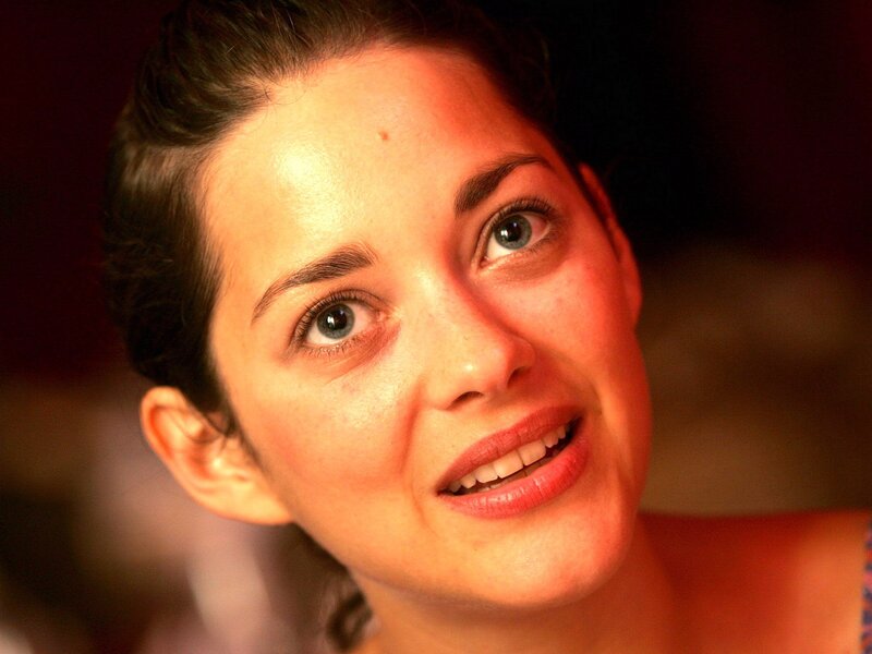 woman with short hair smiling
