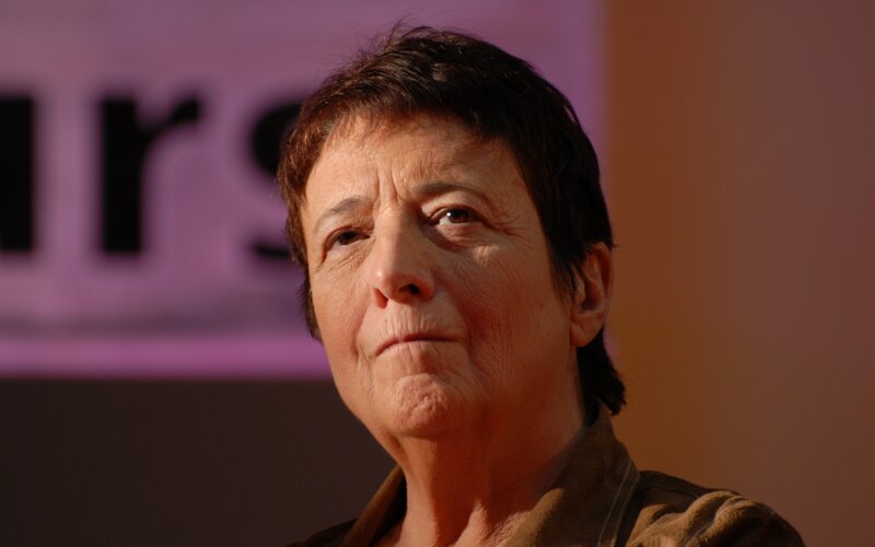 woman with short hair speaking