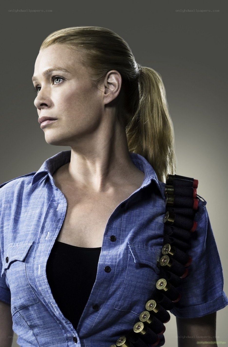 Woman with shotgun shells