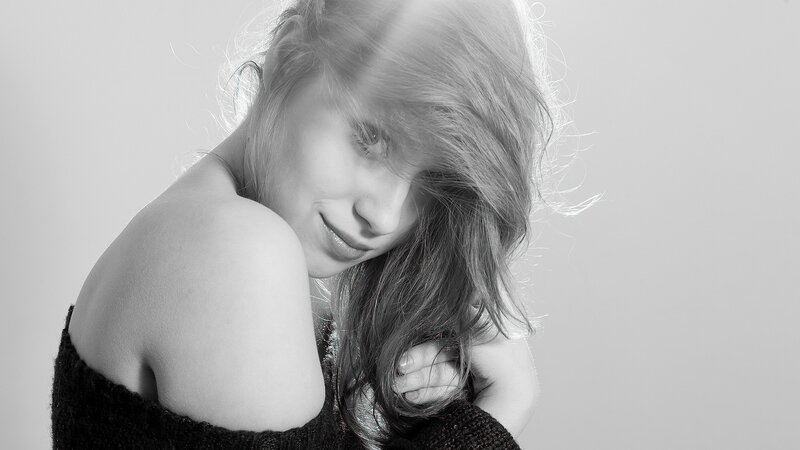 Woman with Shoulder-length Hair — Black, Contemplative