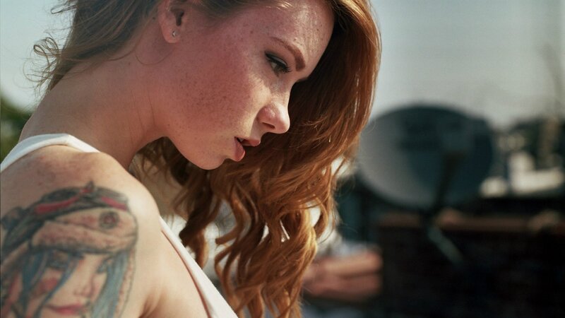 woman with shoulder tattoo
