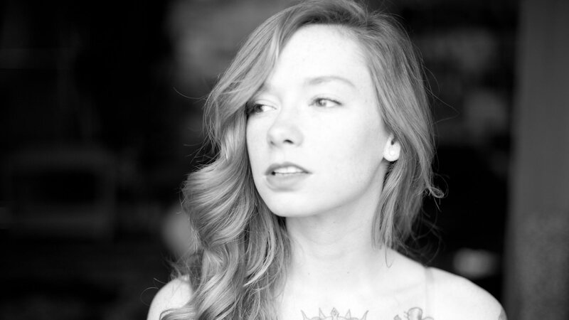 woman with shoulder tattoo