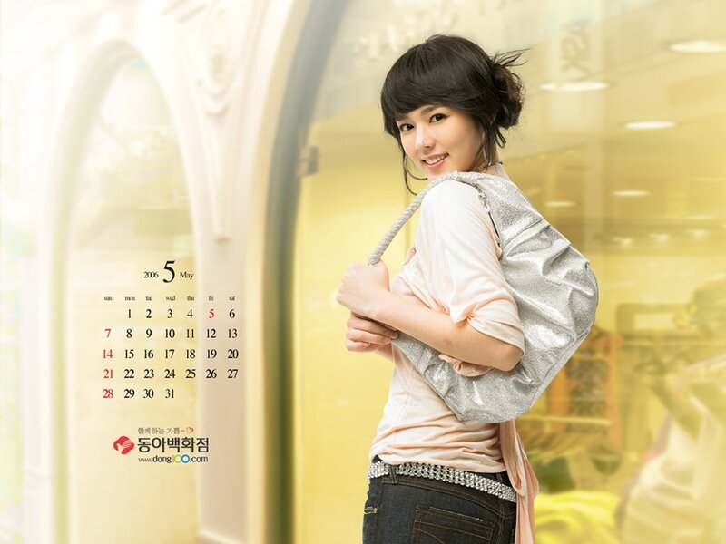 Woman with silver bag in May calendar