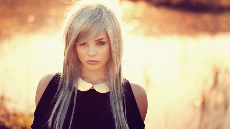 woman with silver hair in sunset