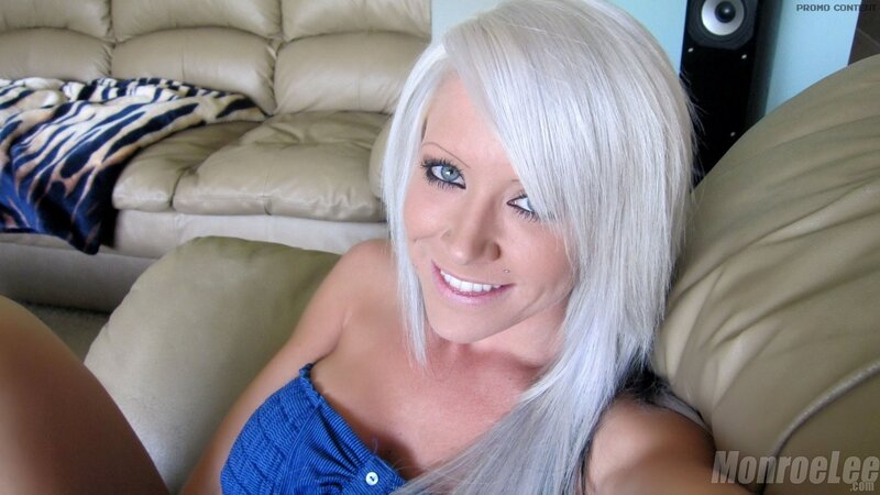 woman with silver hair smiling