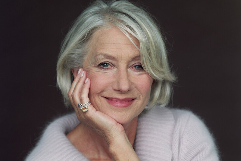woman with silver hair smiling