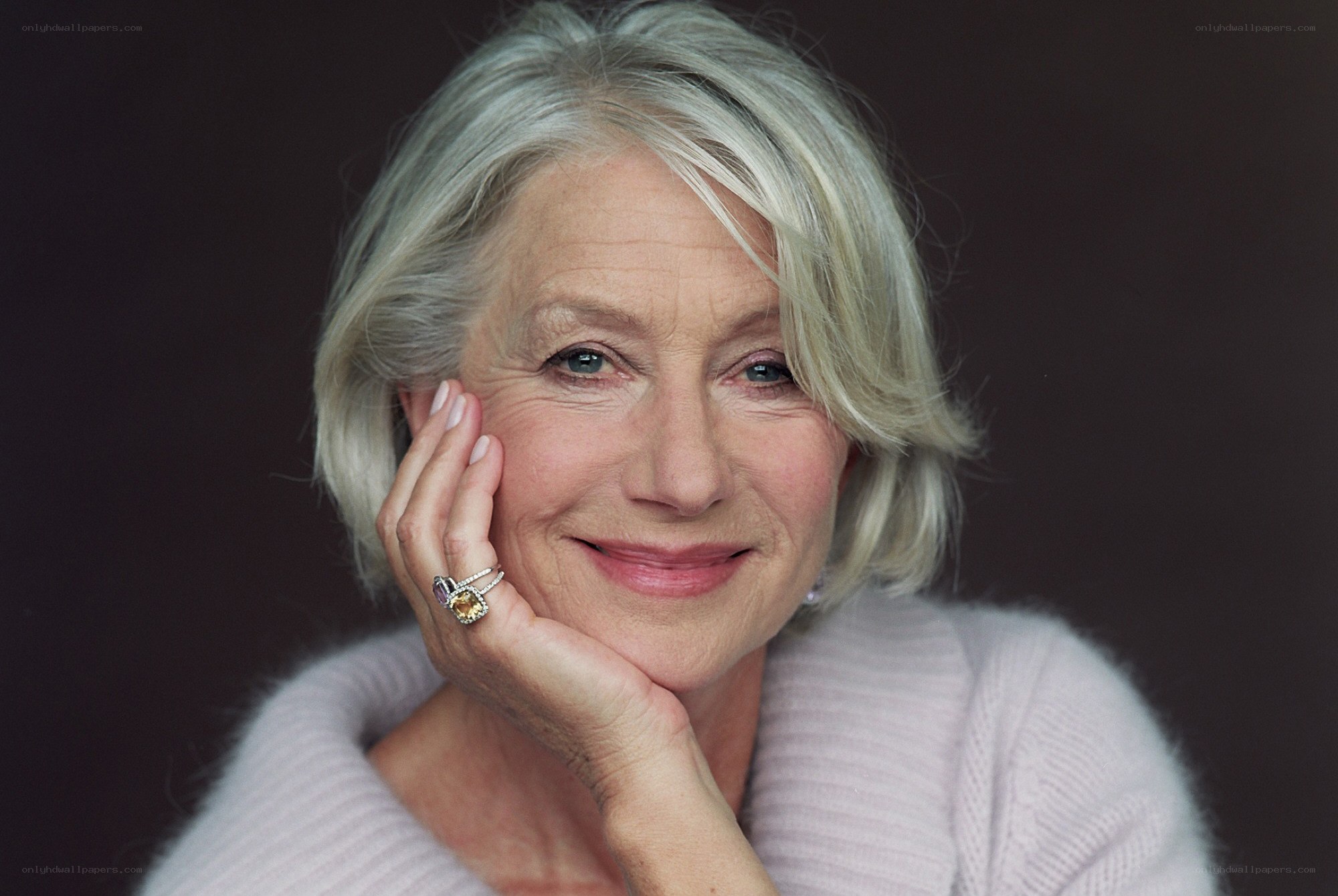 woman with silver hair smiling