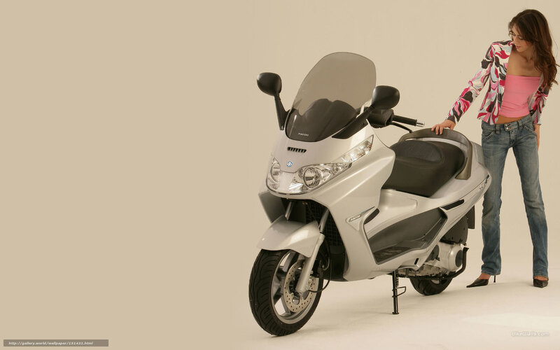 woman with silver scooter