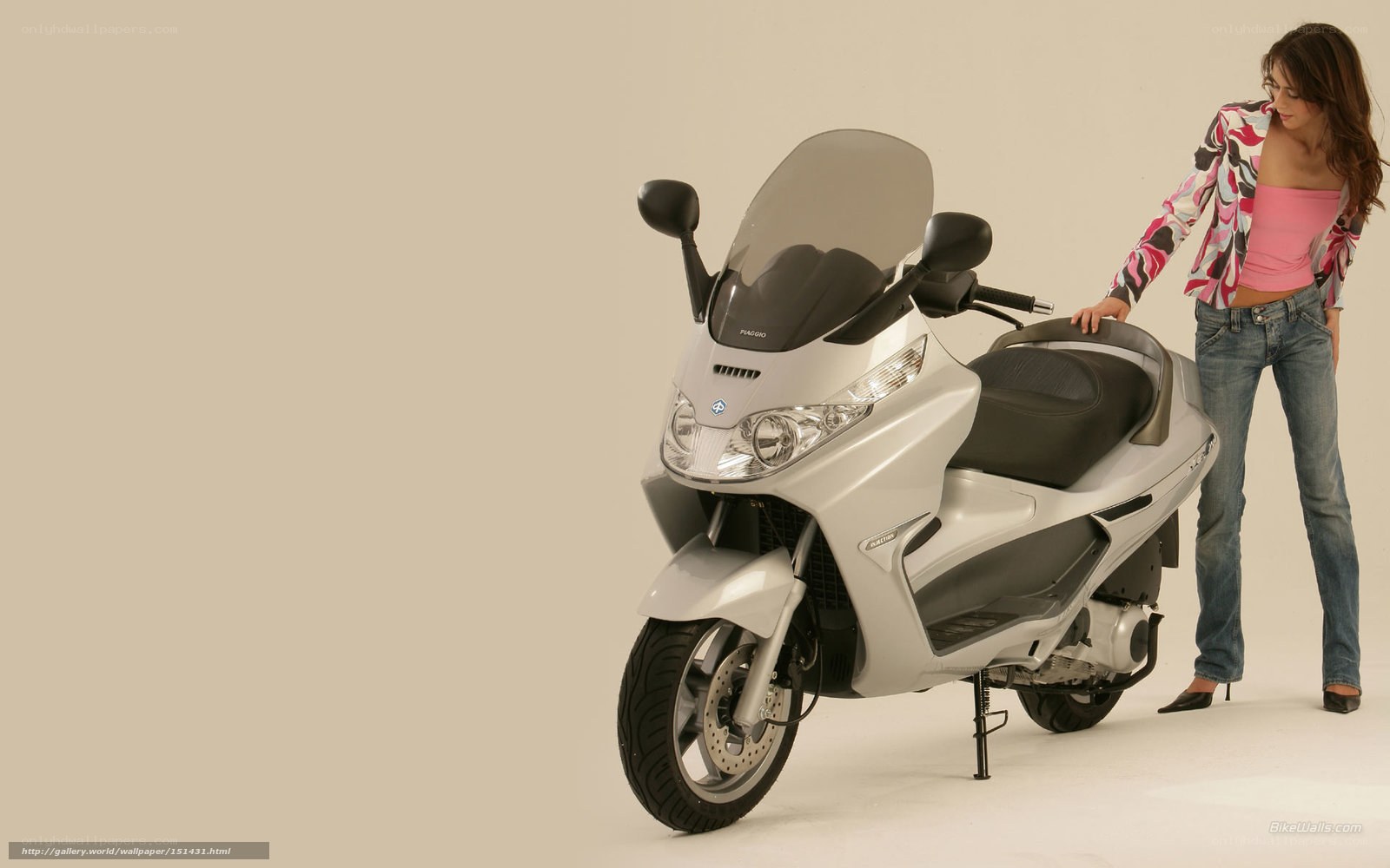 woman with silver scooter