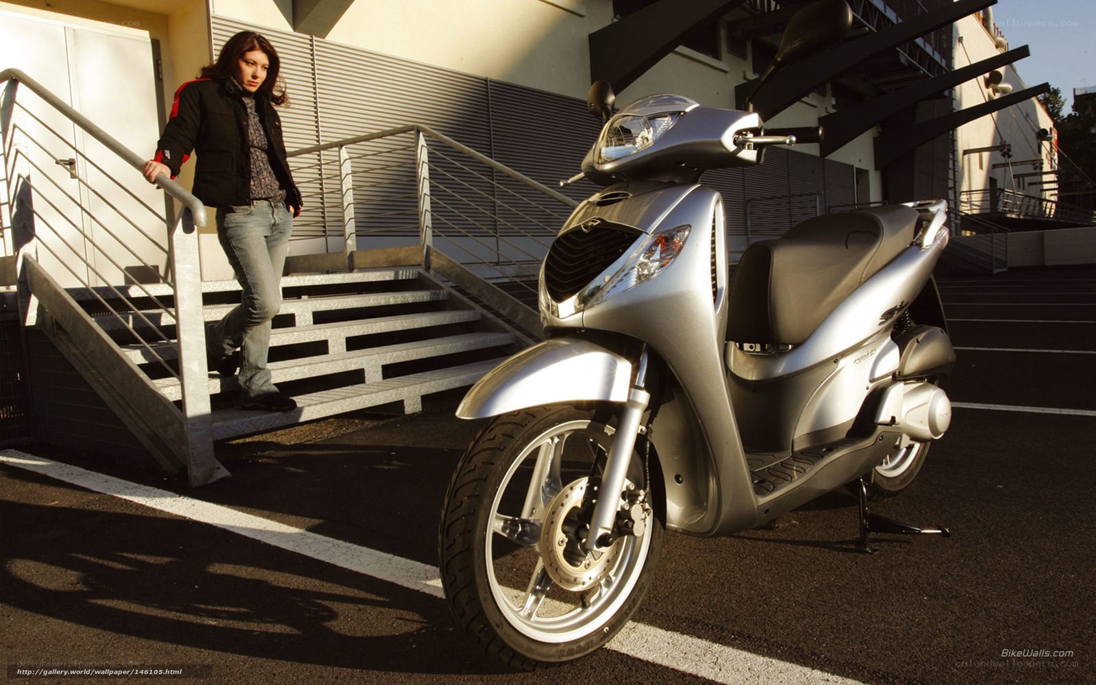 Woman with silver scooter