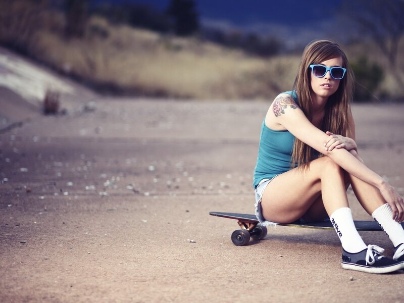 Woman with Skateboard — Blue