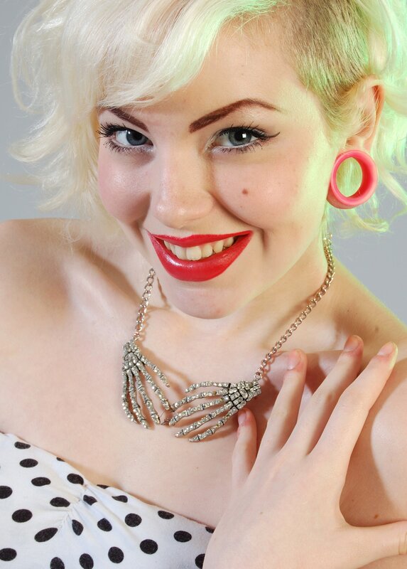 woman with skeleton necklace