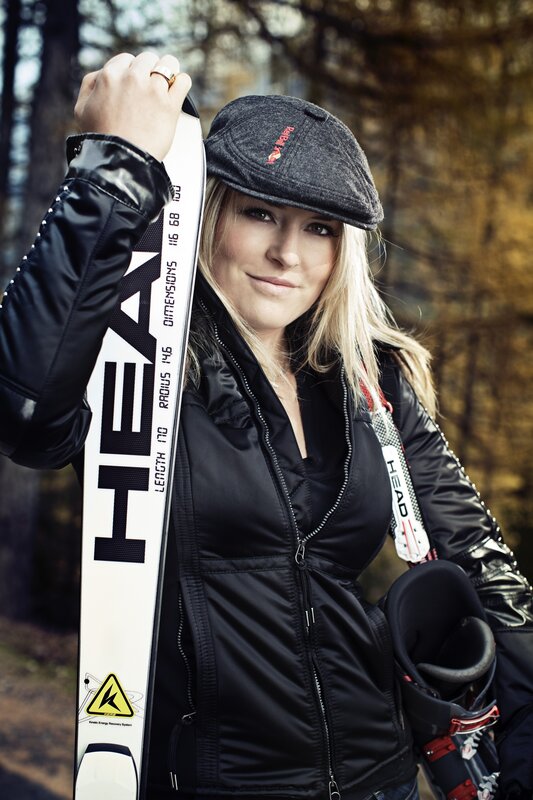 woman with skis in forest