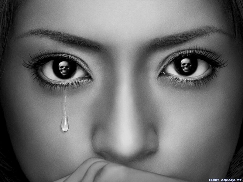 woman with skull eyes crying