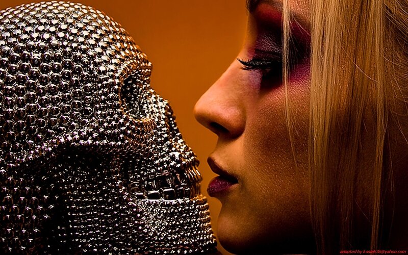 woman with skull sculpture