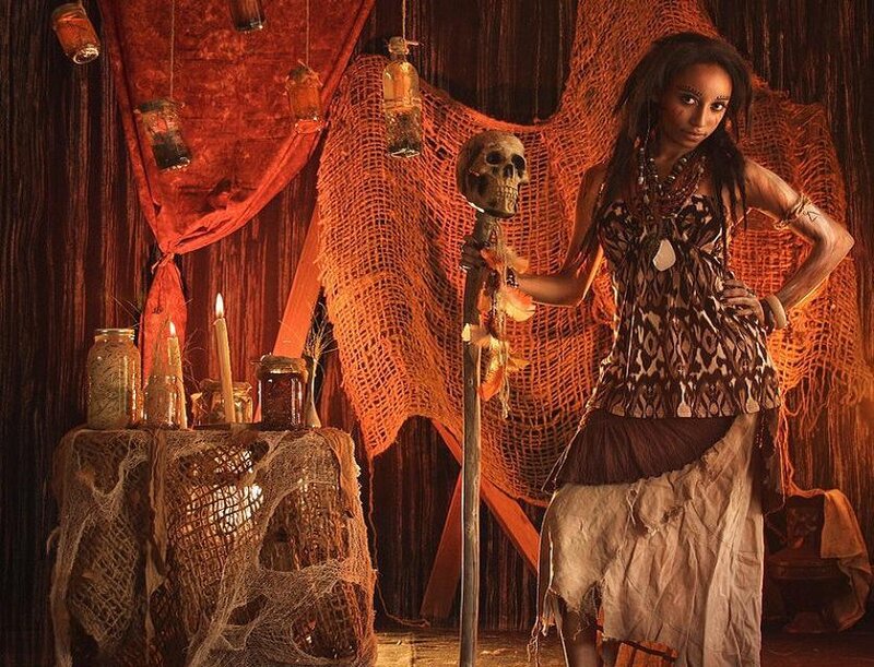 Woman with Skull Staff