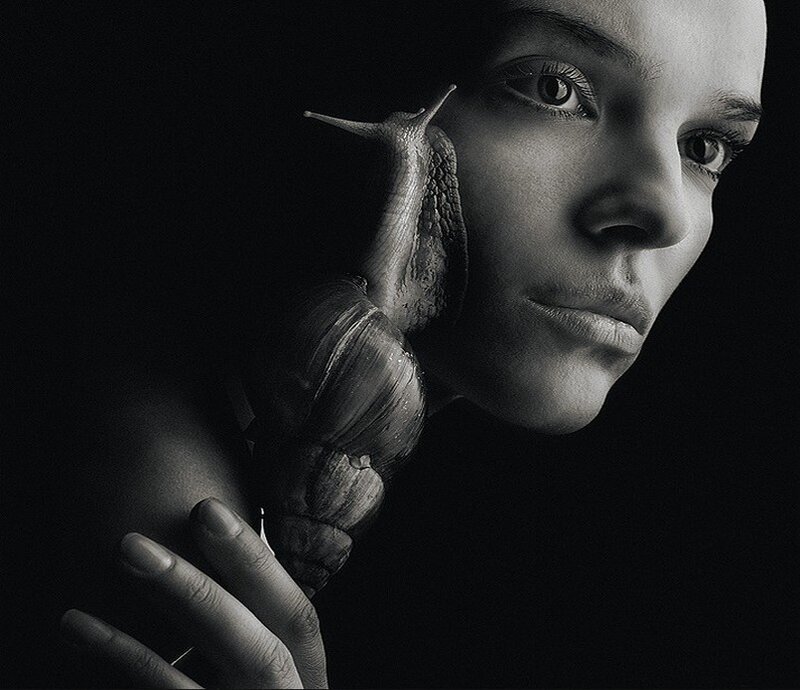 Woman with Snail on Shoulder
