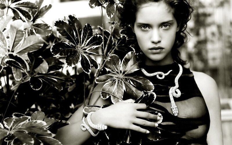 woman with snake jewelry