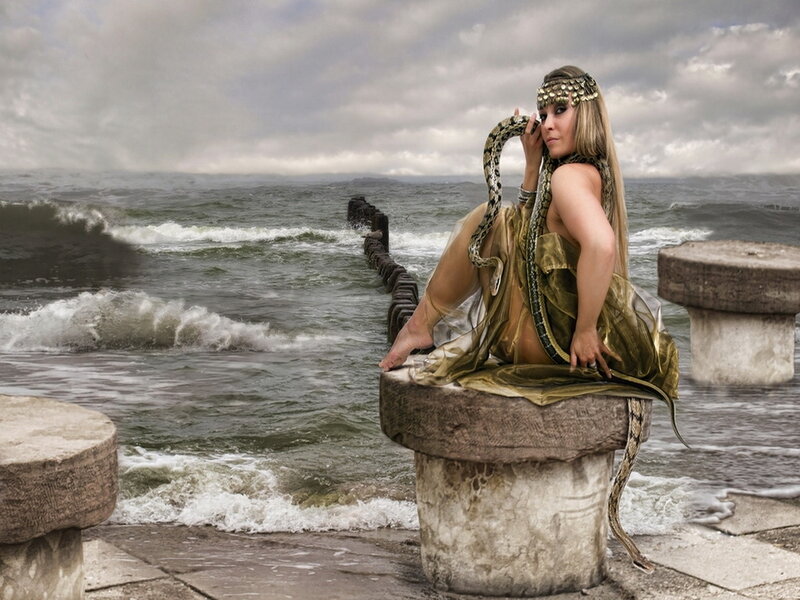 Woman with Snake on Pier