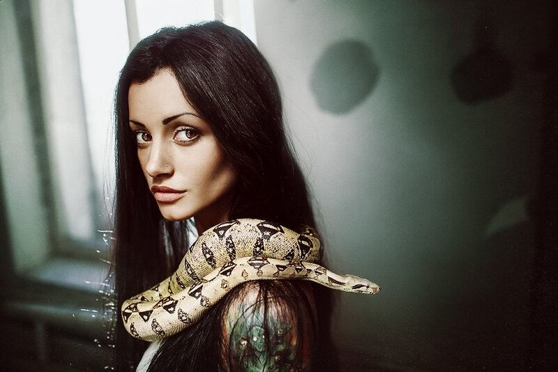 woman with snake on shoulder