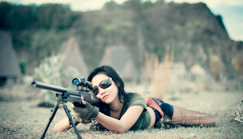 Woman with Sniper Rifle — Green, Focused