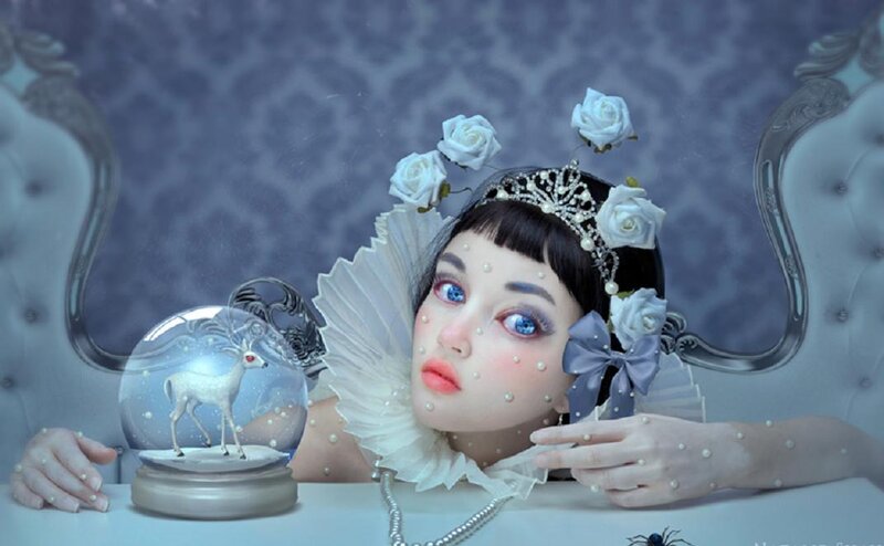 Woman with Snow Globe