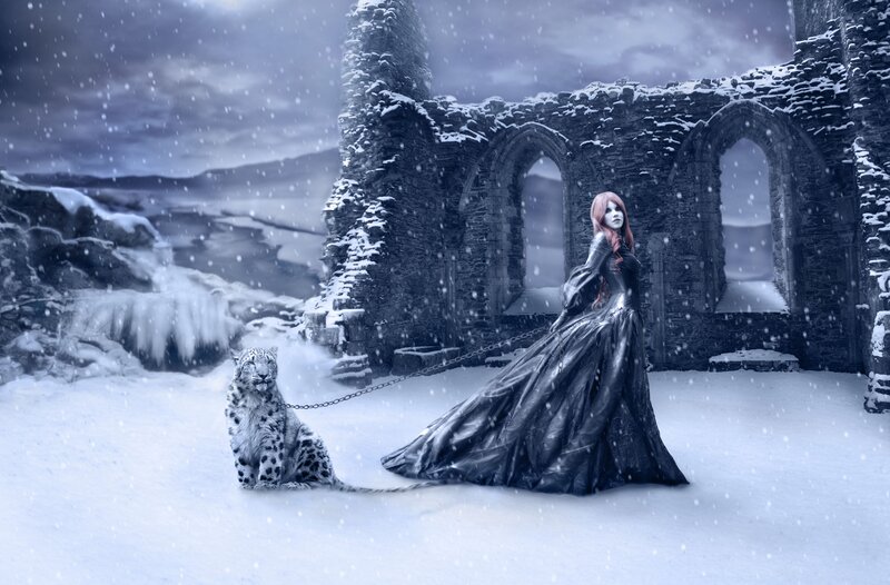 Woman with snow leopard in ruins