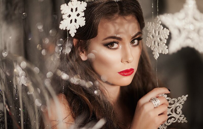 Woman with Snowflake Decorations — White
