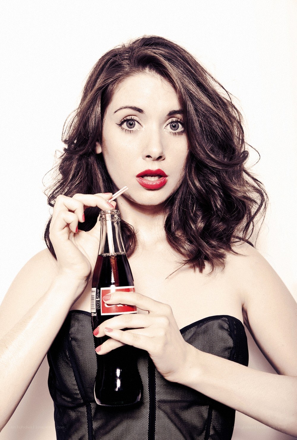 Woman with soda bottle