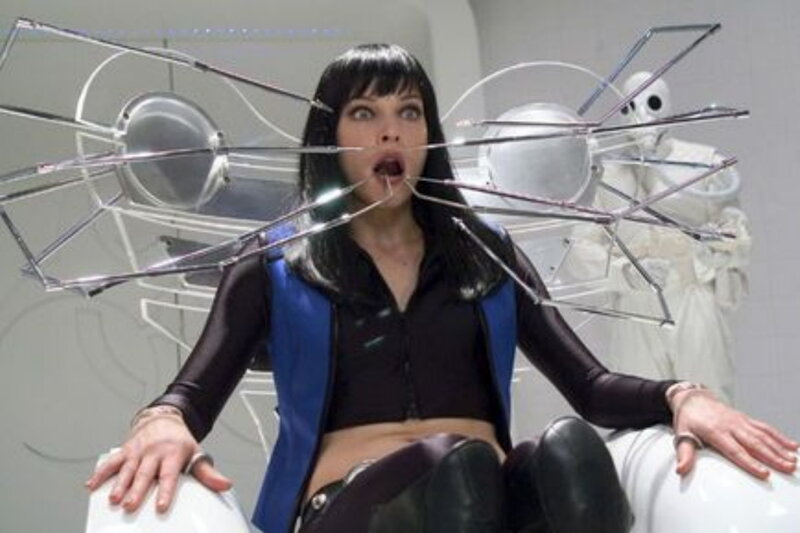 Woman with spider-like device