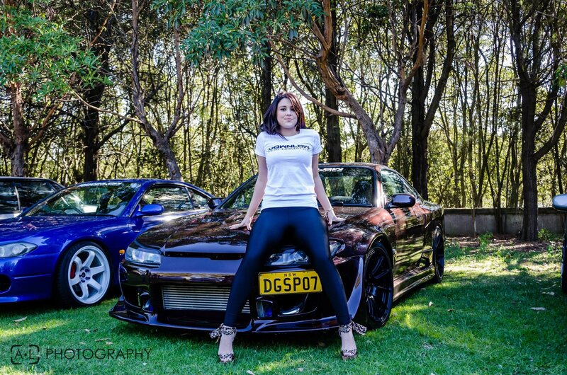 Woman with sports cars
