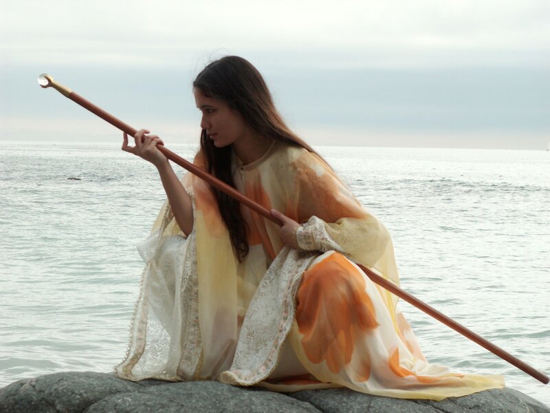 Woman with Staff on Rock — White