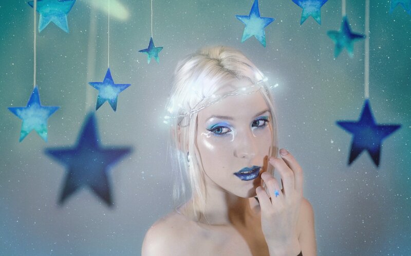 Woman with Star Makeup — Blue