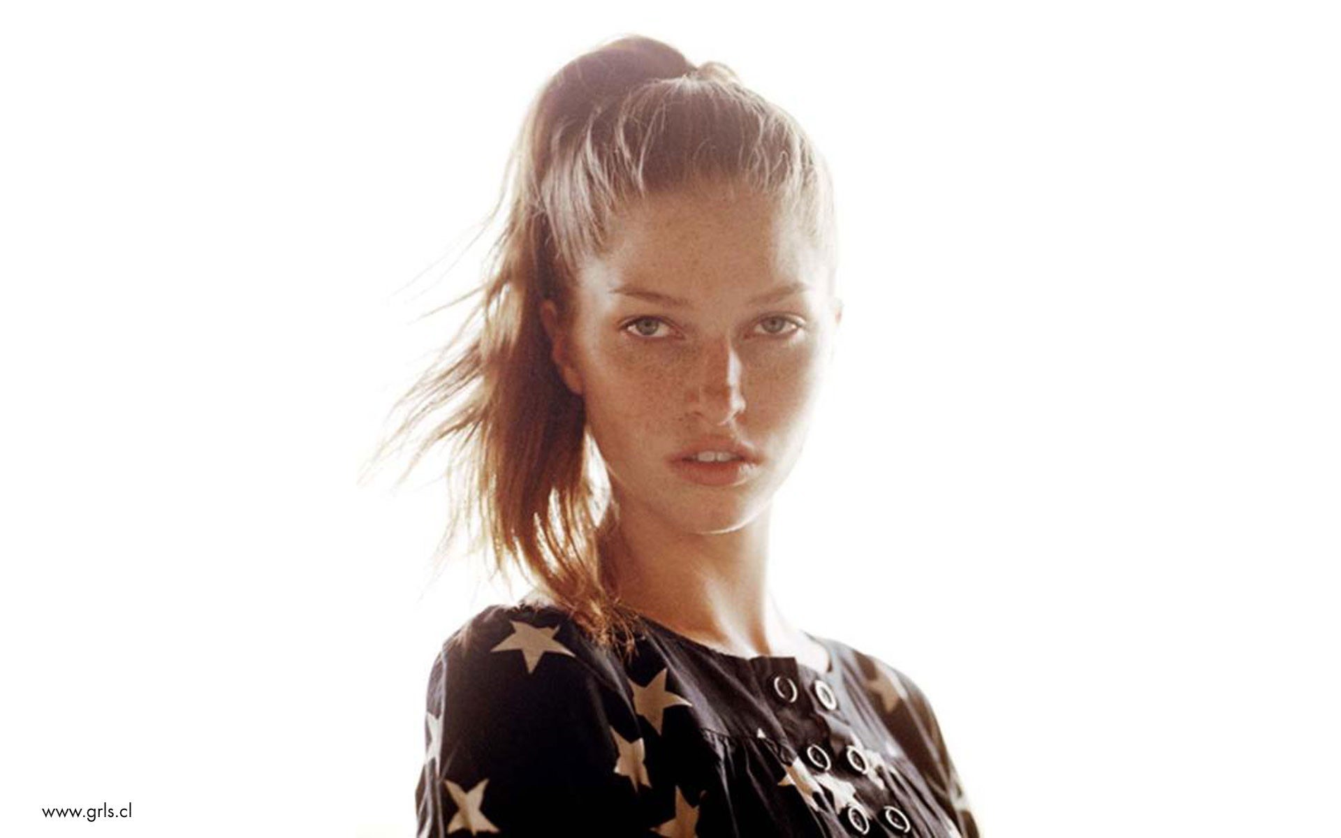 woman with star pattern shirt