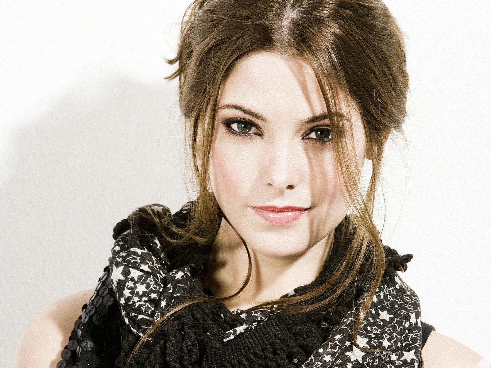 woman with star-patterned scarf