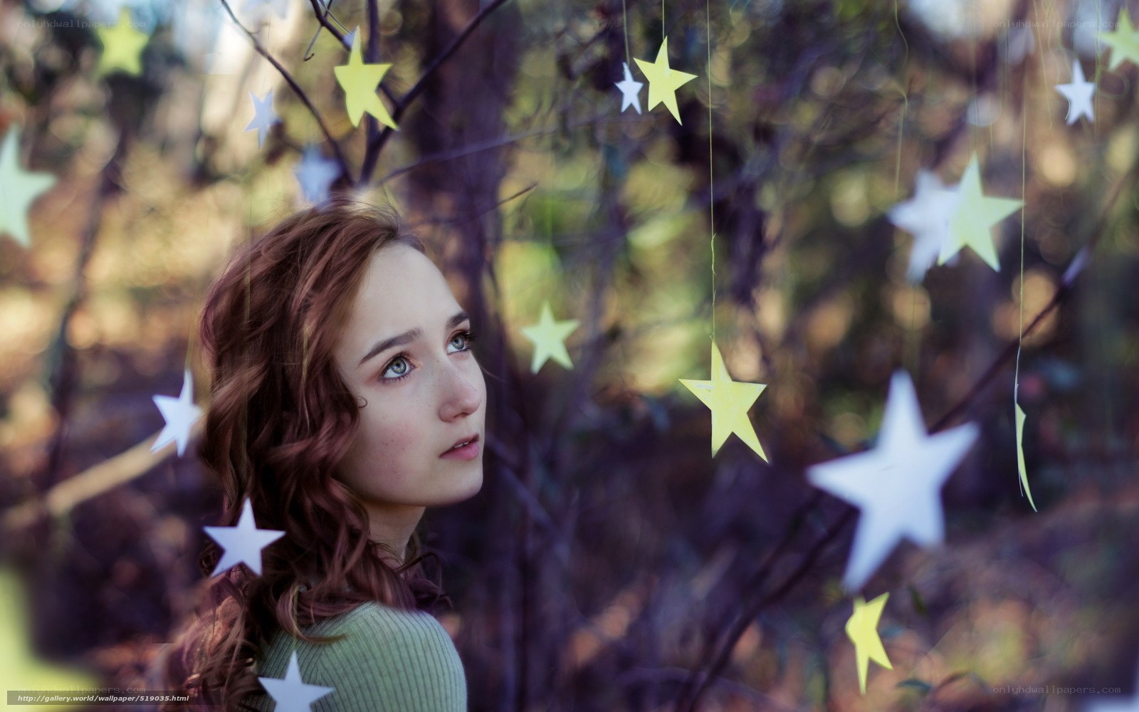 woman with stars in forest